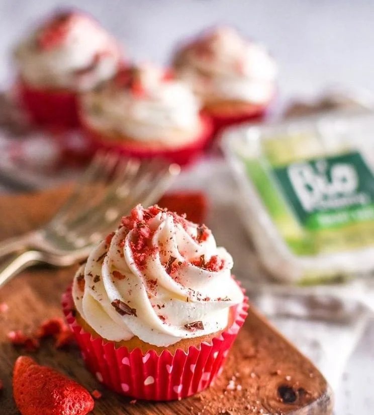 Gorgeously light and fluffy vegan vanilla cupcakes topped with BioCreamy